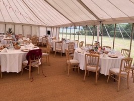 Coir Matting Round Tables and Natural Banqueting Chairs