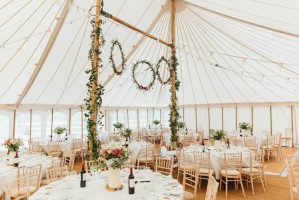 Internal Traditional Marquee, White Festoon Limewashed Chairs Round Tables